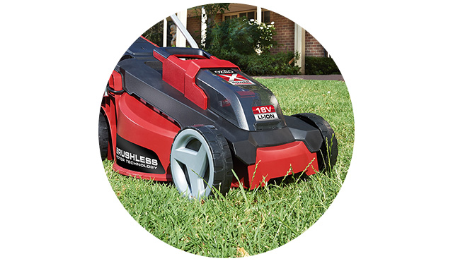 Working with a battery-powered lawn mower