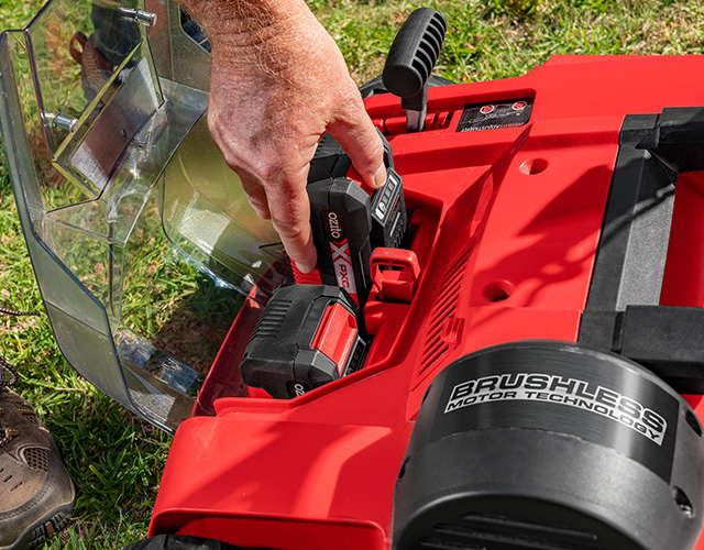 Inserting batteries into the scarifier